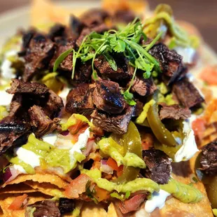 Asada Nachos. Taco Tuesday for $15.00. SOOOO GOOOOD!