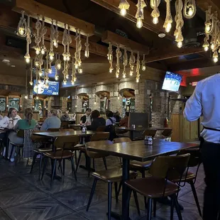 A shop of the restaurant with some of their unusual lighting on ropes