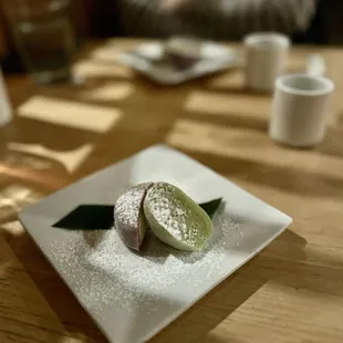 a plate of food on a wooden table