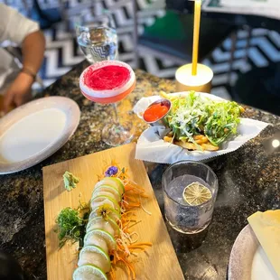 Scallop sashimi, fries, zamatini (top), junglerita