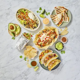 a variety of mexican food on plates