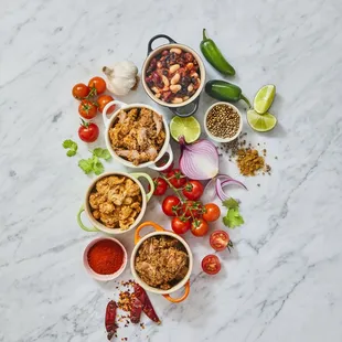 a variety of ingredients on a marble surface