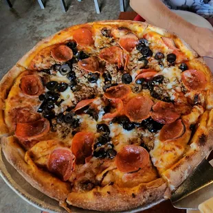 Not an inch was left uncovered, that is how a pizza should be! Fresh ingredients and a hand made pizza crust that is to die for!