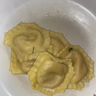 Lobster ravioli with sauce on the side (it&apos;s very lemony).