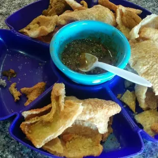 Complimentary cracklin with salsa! (Chicharones)