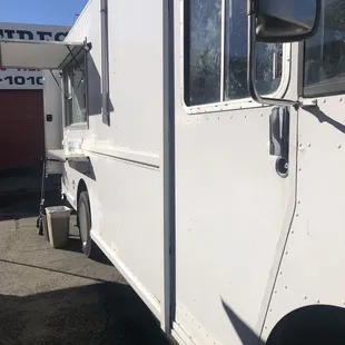 White food truck in lot