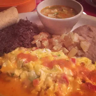 Rancho Grande plate is delicious. Their wait staff is excellent and service can't be beat!