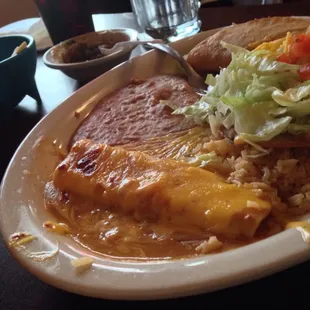 Cheese enchilada in gravy sauce.