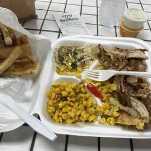 Chicken Shawarma Plate with the corn salad and hummus with hard pita.