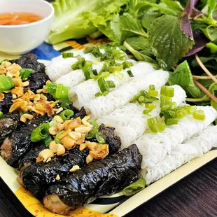 4. BÁNH HỎI BÒ LÁ LỐT 
 Delightfully marinated  beef rolls wrapped in betel leaves and served with rice vermicelli slices (8 rolls)