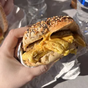 Sausage egg and cheese on everything bagel