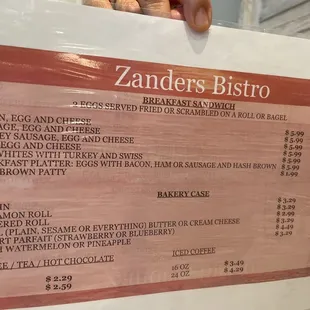 Breakfast menu. The digital screen behind the counter changes for lunch.