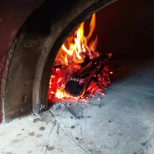 Real wood fired pizza in a mobile oven