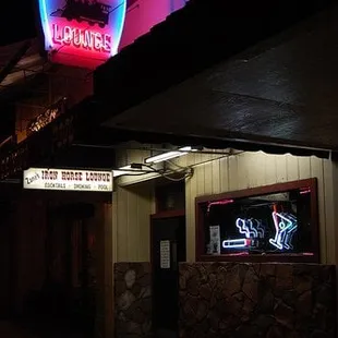a neon sign for a restaurant
