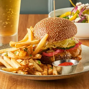 a burger and fries on a plate