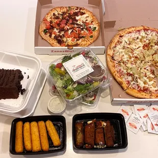 Pizza, salad, mozzarella sticks, eggplant rolotini, and chocolate cake. A feast fit for kings!