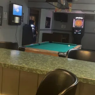 a pool table and billiards