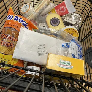 a shopping cart full of groceries