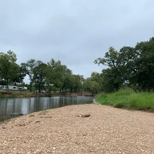 Rocky pebble beach and river
