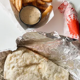 Grande Chicken Burrito, Tigo Fries, southwestern sauce, mild Chilito