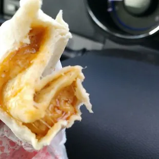 Mmmmmm, cheesy saucy goodness best eaten in a car.