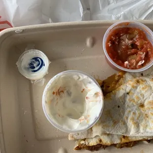 The larger cap is in the front left.