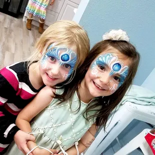 Frozen face painting - girls birthday party theme.