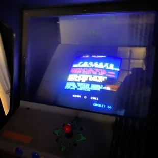 an old arcade game in the dark