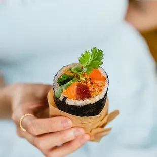 Sushi Burrito | nori, tuna, salmon, cucumber, carrot, avocado, ponzu, sriracha