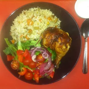 Juicy and tender House seasoned Rotisserie Chicken, vegetable rice and house salad. The lunch time favorite.