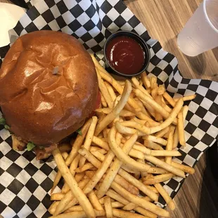 Blackened fish sandwich with side of fries