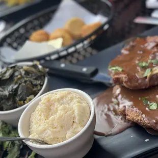 Smothered Center Cut Pork Chops Collard Greens Grits
