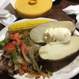 T-Bone, corn, massive potato, and grilled veggies. Was delicious!!