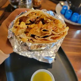 Breakfast Burrito, bacon, egg, cheese, &amp; potato. Salsa bar inside also (11/13/23)
