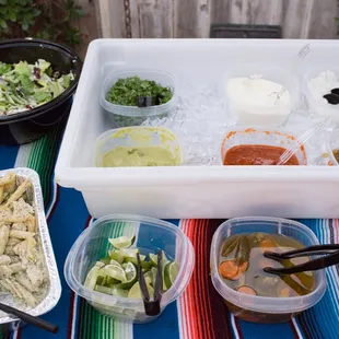 How condiments and sauces are set up. We added few of our own dishes.