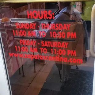 Hours on the door