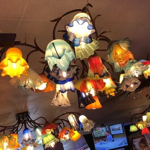 a chandelier made of paper flowers