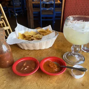 Chips, salsa, picante salsa, and pineapple tajin