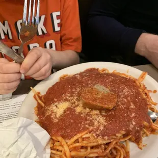 Side spaghetti and half meatball