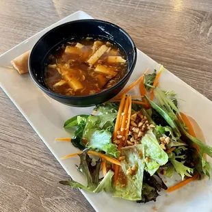 Spring roll, hot and sour soup and small salad with peanut dressing that comes with the lunch special.