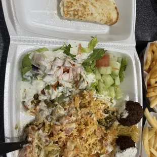 a meal in a styrofoam container