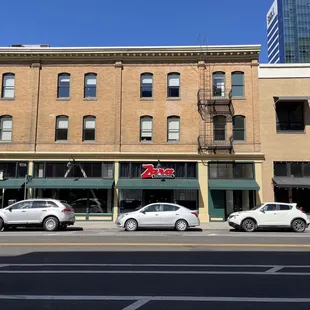 cars parked in front of the restaurant