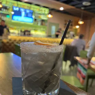  a drink in a glass on a table