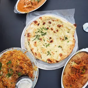 Naan, chicken biryani, chicken Tikka masala and chicken haleem