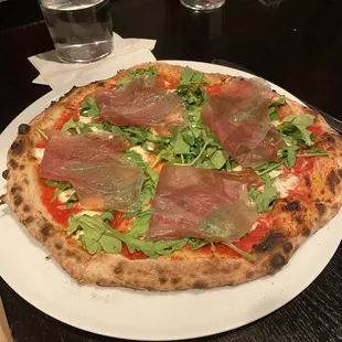 Prosciutto arugula pizza