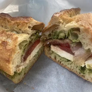 Caprese sandwich (Fresh Mozzarella, tomato, pesto) with added prosciutto