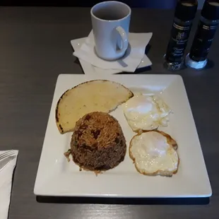 Breakfast: Egg Calentado. Meh. Seemed like they  just &quot;threw this together&quot;: rice/beans were not warmed through. Sloppy cooking.