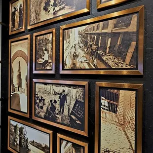 a wall full of old photos