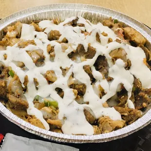 Loaded fries with lamb and chicken