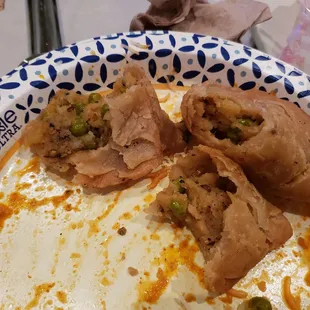 Simosas. Supposed to be beef simosas, but I got vegetarian. Mush inside